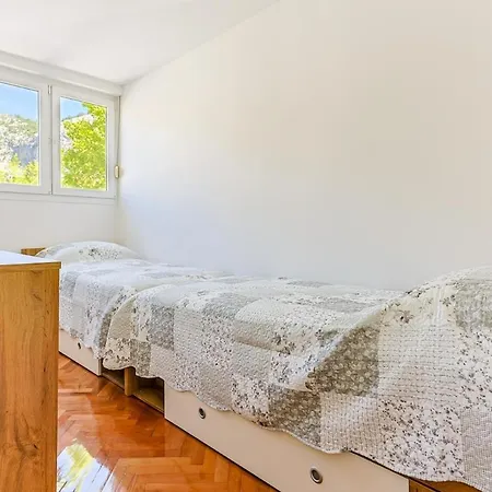 Kenova - Center Omis